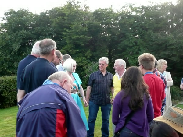 Image of the German Exchange - Lion President Peter telling a German joke. They laughed anyway!